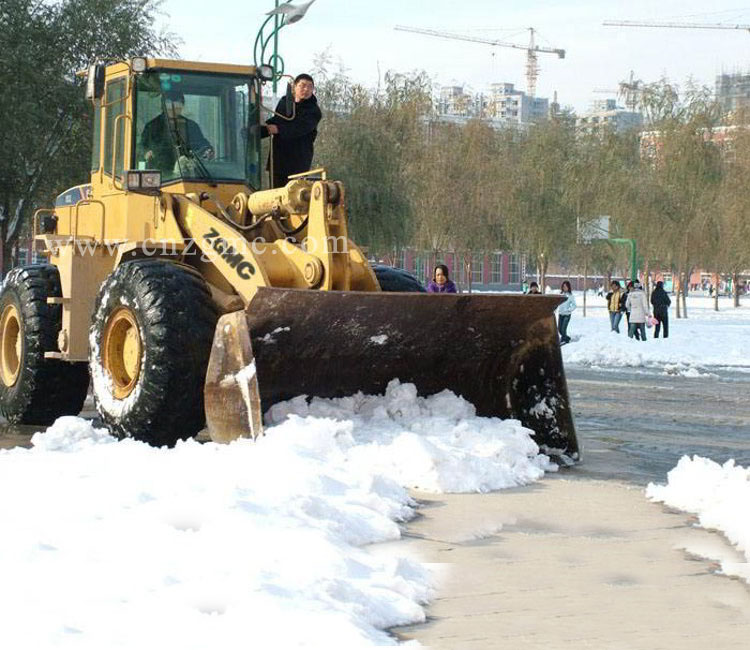 Wheel loader used to load snow